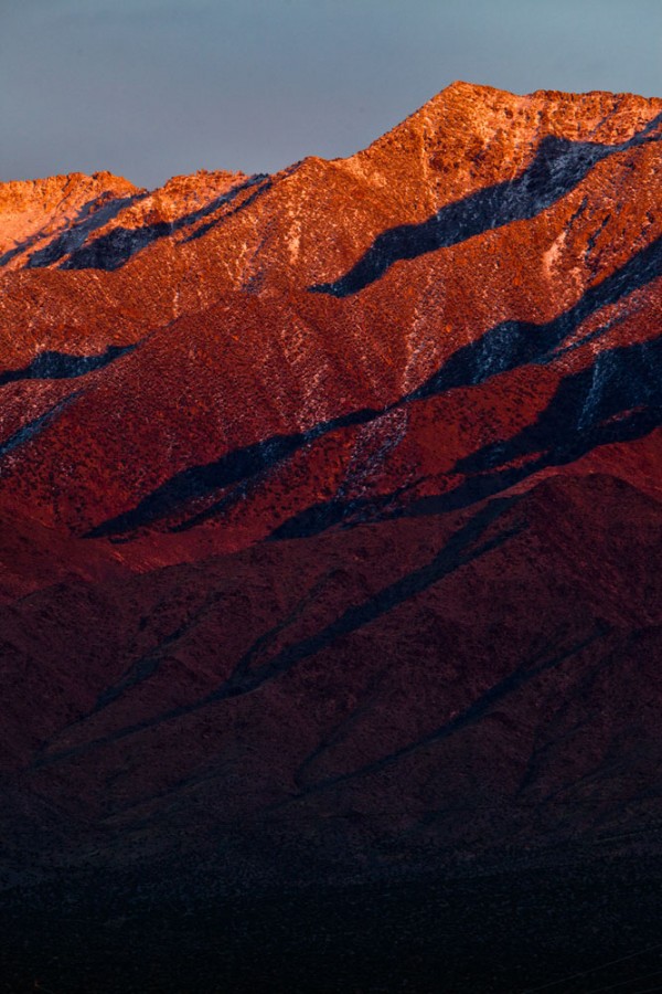 Golden light hitting mountains outside of Scenic, Arizona